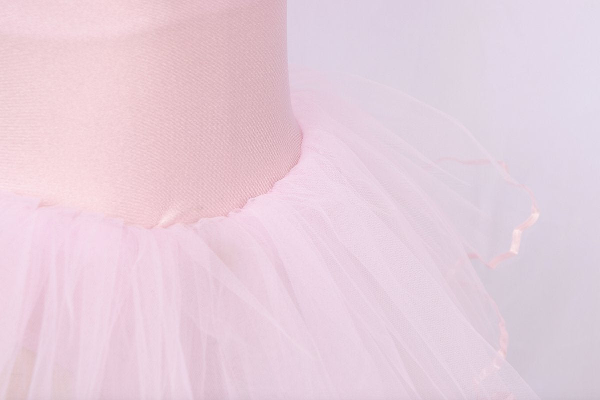 Roze balletpakje met tutu en glitterprint